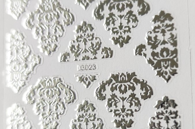 Nálepka stříbrná 23